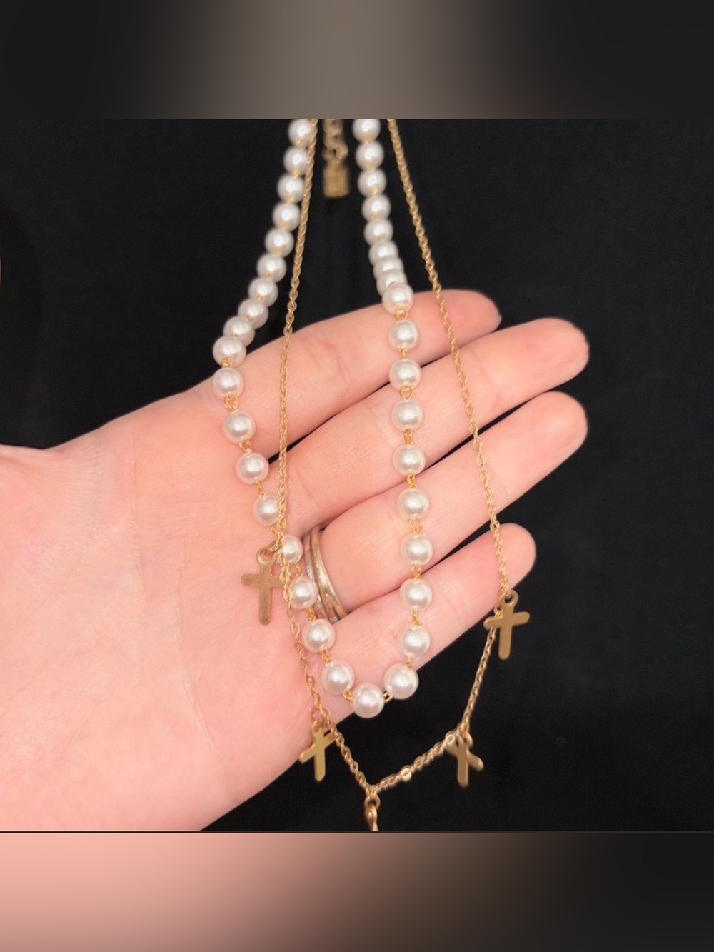 Pearl and cross layered necklace